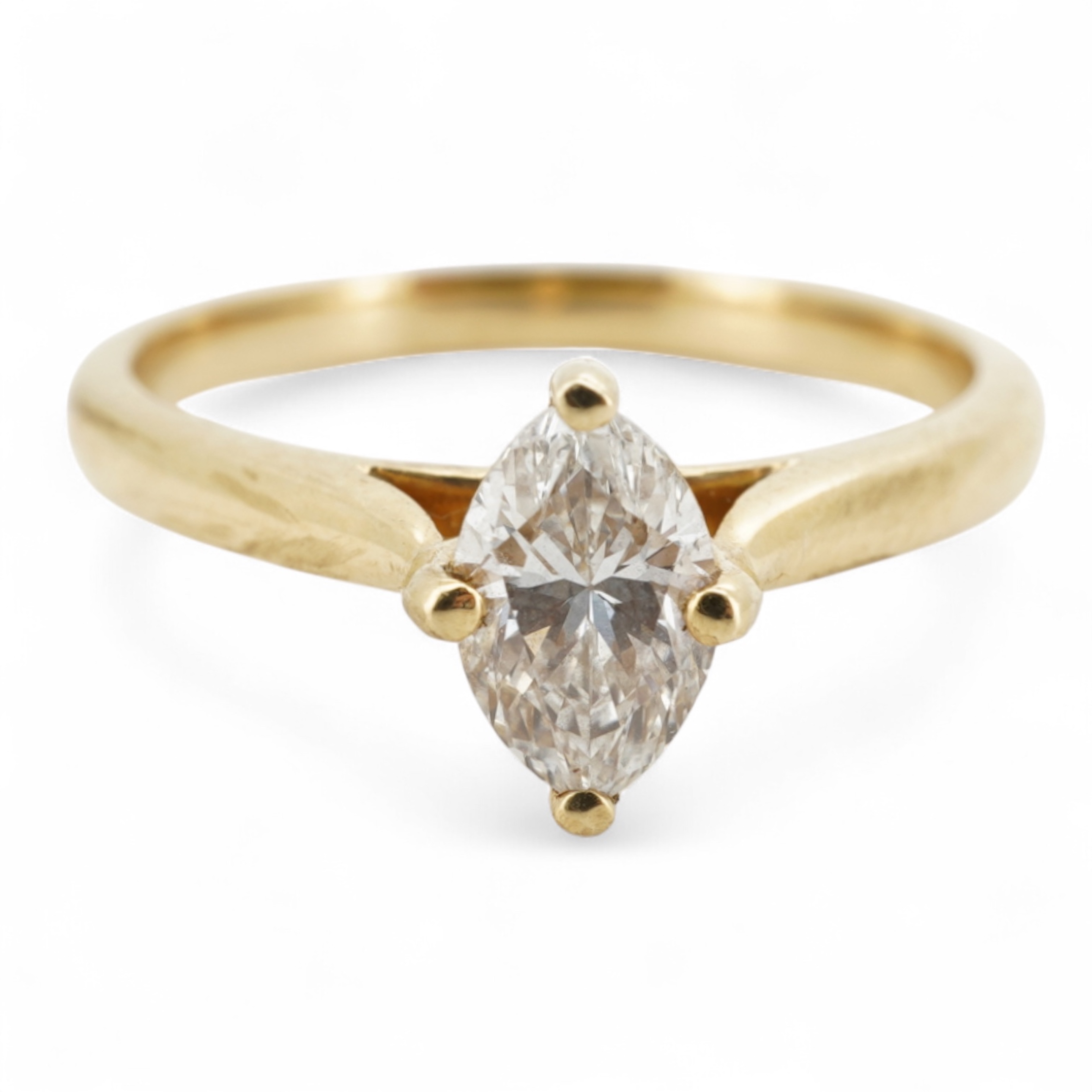 A diamond ring, claw-set with a marquise-shaped diamond weighing approximately 0.70 carats, mounted in gold, size L1/2, gross weight approximately 3 grams